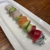 Rainbow Roll · Raw. Crab, avocado, cucumber with tuna, salmon, and white fish on the top. 