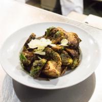 The Brussels Sprouts · Brussels sprouts toasted golden brown, tossed with a warm bacon vinaigrette and shaved asiag...