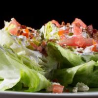 Wedgey Salad (Sometimes enough for 2). Dressing always on the side) · Towns version of the classic wedge. Iceberg, fresh diced tomatoes, bacon and blue cheese 2 w...