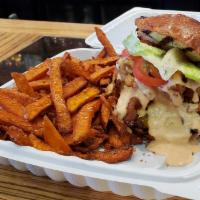The Town Burger · 1/3 Lb hand formed patty, applewood smoked bacon, cheddar cheese, onion straws, lettuce and ...