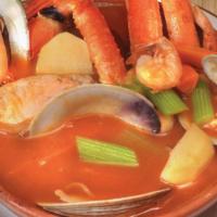 Caldo Mariscos · Seafood soup. Shrimp, octopus, calamari, crab legs, mussels, and fish.