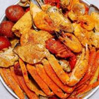 Seafood Platter · Snow crab, whole shrimp, crawfish, mussels, clams, corns and potatoes. Not sold by the 1 lb....