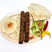 Beef Kafta ( Lulah ) Plate · 2 skewers of charbroiled ground beef. comes with hummus, salad, rice .