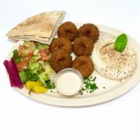 Falafel Plate · 6 pieces of fried smashed garbanzo with garlic and spices, served with hummus and salad ,and...