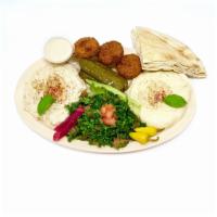 Veggie Plate · Tabouli, hummus, baba ghanouj, grape leaves , falafel and tahini sauce