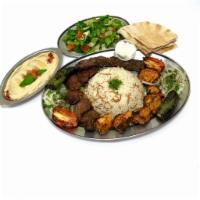 Mix Grill Aleppo (For 2 people) · 5 pieces of beef shish, 1 skewer of beef kafta, 5 pieces of chicken shish and grilled vegeta...