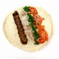 Luleh Beef Kafta Wrap · Served with tomato, parsley, onions and sumac.