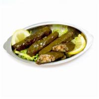 Grape Leaves · Rolled cooked grape leaves stuffed with rice, garbanzo beans and vegetables.
