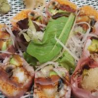 Valentine Roll · Shrimp tempura, eel, avocado and lobster salad with soy bean seaweed.