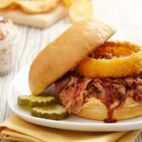 Double BBQ Pork Sandwich · Tender pulled pork, sweet BBQ and 'Bama white BBQ sauce, topped with 1 of our signature onio...