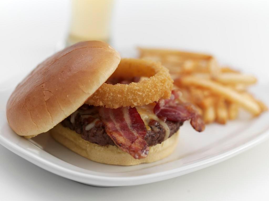 BBQ Bacon Burger · Topped with our sweet BBQ sauce, applewood smoked bacon, cheddar jack cheese and 1 of our signature onion rings, served on a brioche bun.