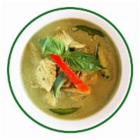 Green Curry · Green curry paste with coconut milk, bamboo shoot green bean, bell pepper, zucchini, thai ba...