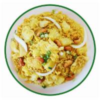Pineapple Fried Rice · Stir-fried with egg, pineapple, cashew nut, onion, curry powder.