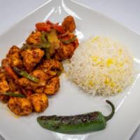 Chicken Sautee · Chicken sautee with green peppers, onions, tomatoes, oregano, and spices. Served with rice p...