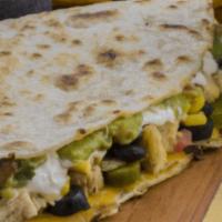 Quesadilla · Start off with our mouthwatering quesadilla, then add your choice of protein, rice, beans, a...