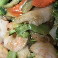 Seafood Delight · Fish, shrimp and crabmeat with mixed vegetables in XO seafood sauce. Hot and spicy.