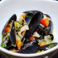 Zuppa di Cozze · Mussels sauteed in choice of spiced tomato broth or white wine, garlic and olive oil.
