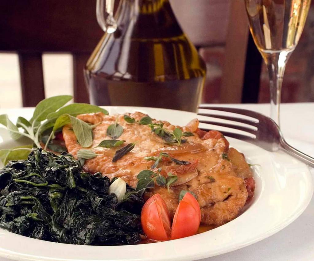 Vitello Piccata · Veal medallions sauteed in white wine, lemon and capers. Served with sauteed spinach.