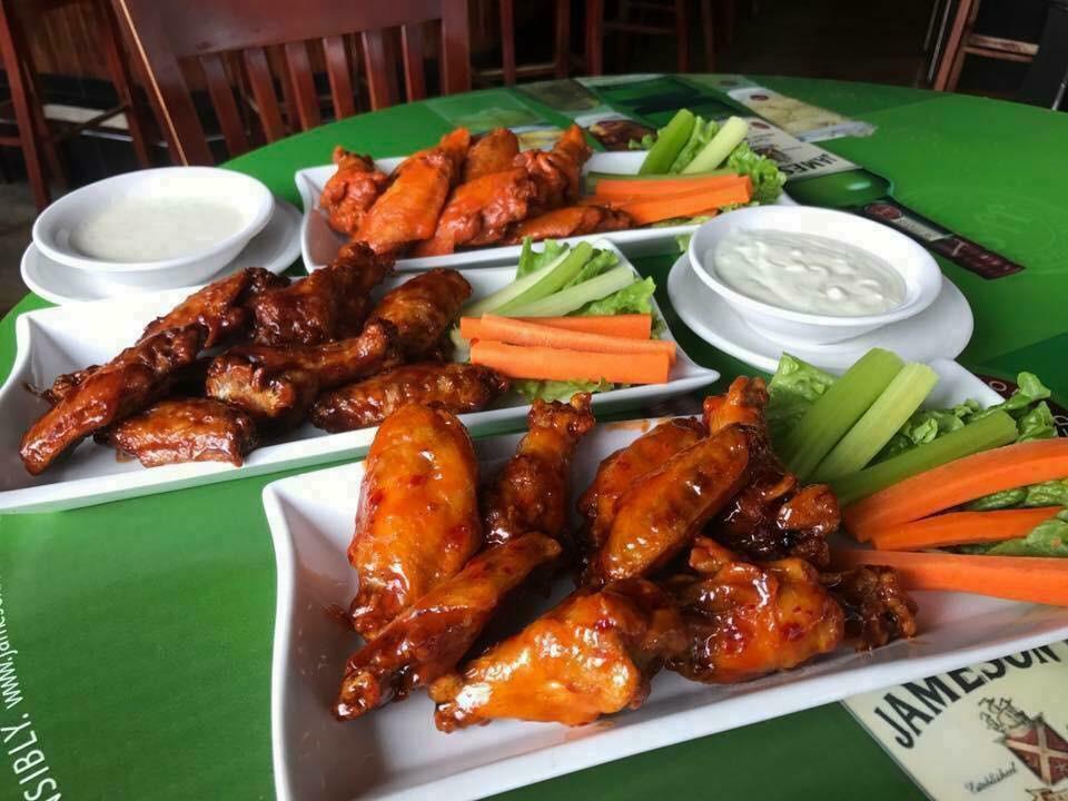Boneless Wings · Served with bleu cheese or ranch dressing, carrots, and celery sticks.