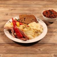 Corned Beef & Cabbage · Thick cut corned beef with shredded cabbage and colcannon mashed potatoes. Served with cream...