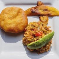 Bake and Saltfish · Sautéed Saltfish with Garlic, Onions, Sweet Peppers, Thyme, and Tomato served with a Bake an...