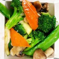 Sauteed Garden Vegetable · Broccoli, zucchini, carrots, napa cabbage,snow peas and water chestnuts stir fried in a ligh...