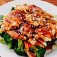Teriyaki Chicken · Grilled chicken over steamed vegetables topped with house teriyaki sauce. 