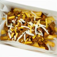 Chili Cheesus Fries · Classic chili with pinto beans and shredded cheese atop some shoestring fries.