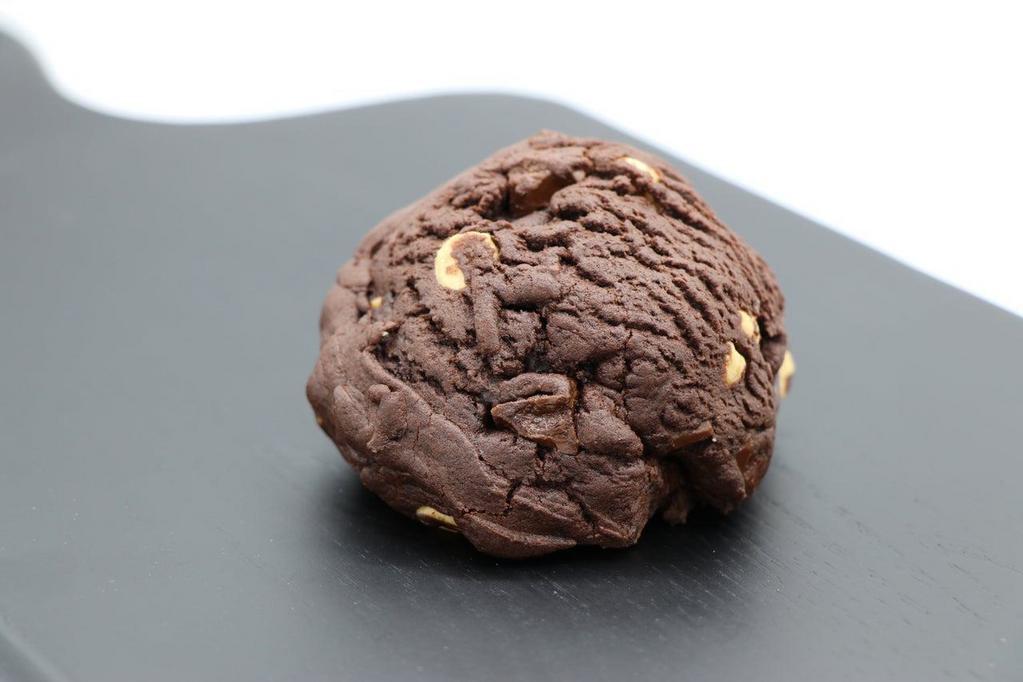 Choc Blocker: · This dark chocolate big boi is stuffed with peanut butter chips and semi-sweet chocolate chunks. If ever I had the opportunity to choose how I die, this cookie would be it. 