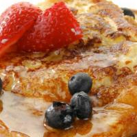 Classic French Toast · thick sliced brioche bread dipped in our homemade batter, sprinkled with  powdered sugar