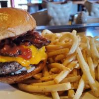 BBQ Bacon Burger · Sandwiches served with choice of house made potato chips, coleslaw or fries. BBQ sauce, baco...