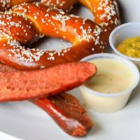 Bavarian Plate · Spicy sausage, spicy mustard, cheese sauce and Bavarian soft pretzel.