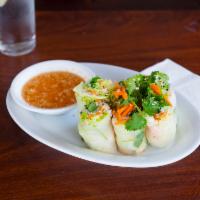 Summer Rolls · Lettuce, cilantro, mint, carrots and noodles wrapped in fresh rice paper.