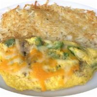 Veggie Omelette · Has onions, bell peppers, mushrooms and Jack and cheddar cheese. Served with hash browns wit...