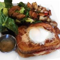 Croque Madame · Gruyere cheese and prosciutto on sourdough bread, topped with hollandaise sauce. Served with...