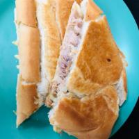 Lechon Sandwich · Roast pork sandwich. 