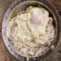 Arroz Blanco con 2 Huevos Fritos · White rice with 2 fried eggs.