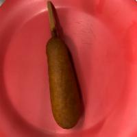 Perro Caliente con Masa de Maiz · Corn dog.