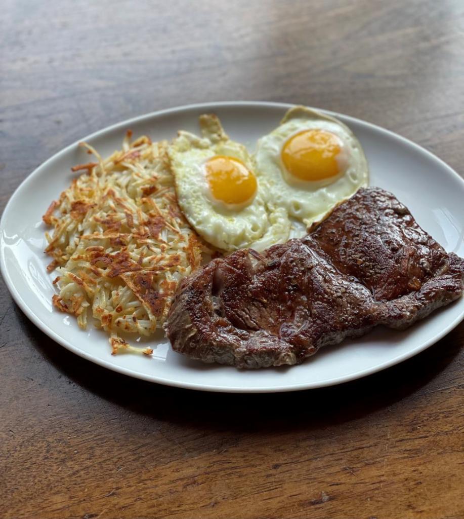 Steak & Eggs · 8 oz. flatiron steak, two eggs any style , served with cheesy hash browns 