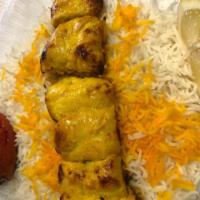 Boneless Chicken Kabob Dinner · Marinated, skewered and broiled served with fluffy rice topped with saffron and tomato.