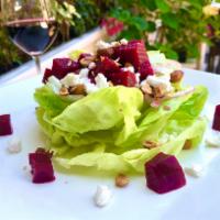 Butter Lettuce Salad · Roasted beets, red onion, hazelnuts, goat cheese and fresh herb vinaigrette.