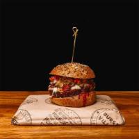 Spicy Vegan Village Veggie Burger · Organic, soy free, handcrafted vegan burger. Vegan mozzarella cheese, pico de gallo, sautéed...