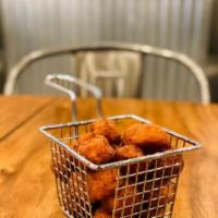 Large sweet tots · Gluten free.  Served with 2 dips.