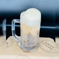 Cola Float · Made with organic ice cream and maine root soda.