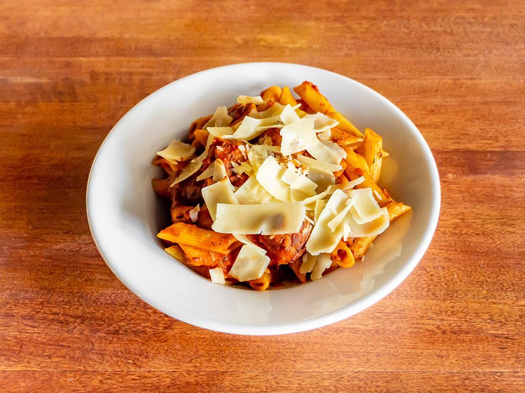 Pasta with Meatballs · Penne pasta, bolognese sauce and shaved Parmesan.
