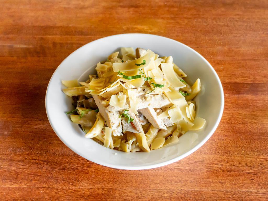 Pasta with Grilled Chicken · Penne pasta, creamy mushroom sauce and shaved Parmesan.