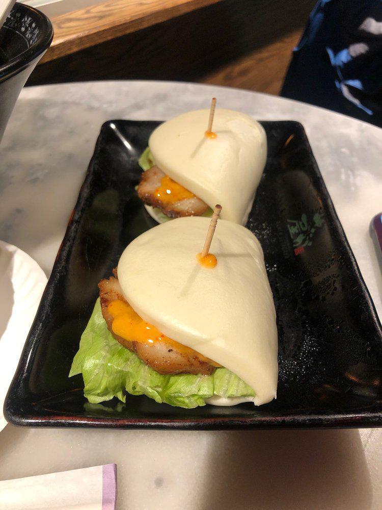 Hiroshi Bun (Pork) · Steamed bun, chashu pork, lettuce, scallion and spicy mayo (2 pieces).
