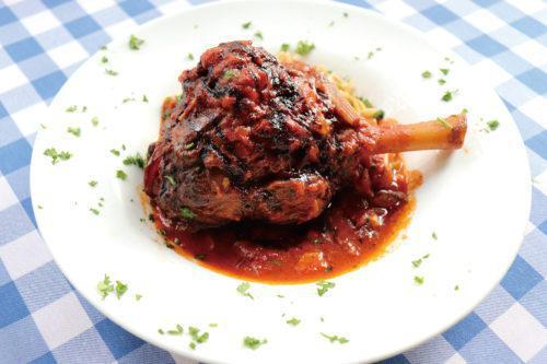 Lamb Shank Giouvetsi · Lamb shank oven baked with orzo, in tomato sauce.