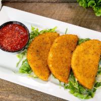 Uptown Mozzarella · 4 large breaded mozzarella 1/2-moons fried to a golden brown and served with homemade marina...