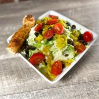 House Salad · Garden fresh mixed greens, pepperoncini, black olives and grape tomatoes, topped with Parry’...